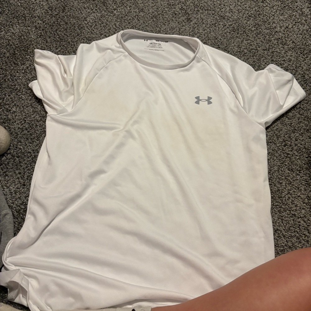 white under armor shirt. NEVER WORN!